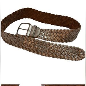 Fossil, metallic, weave leather belt with silver metallic sheen.